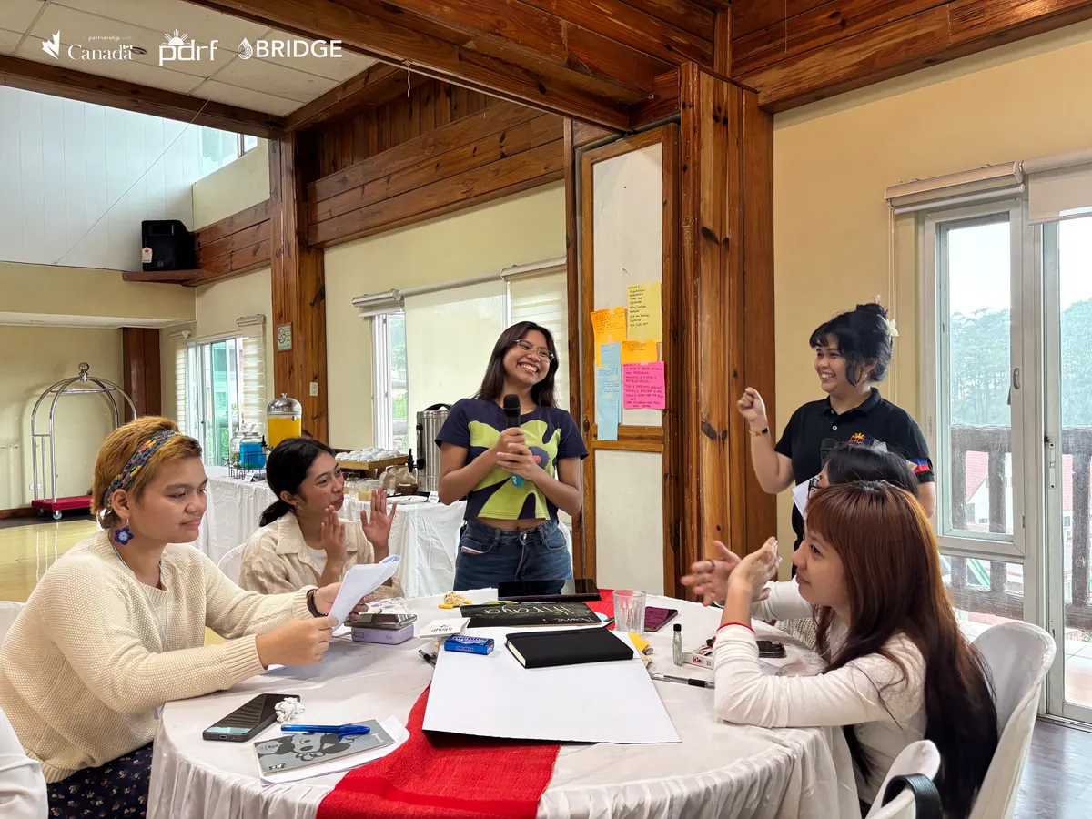 Young women leaders participate in a facilitated Camp HARAYA session.