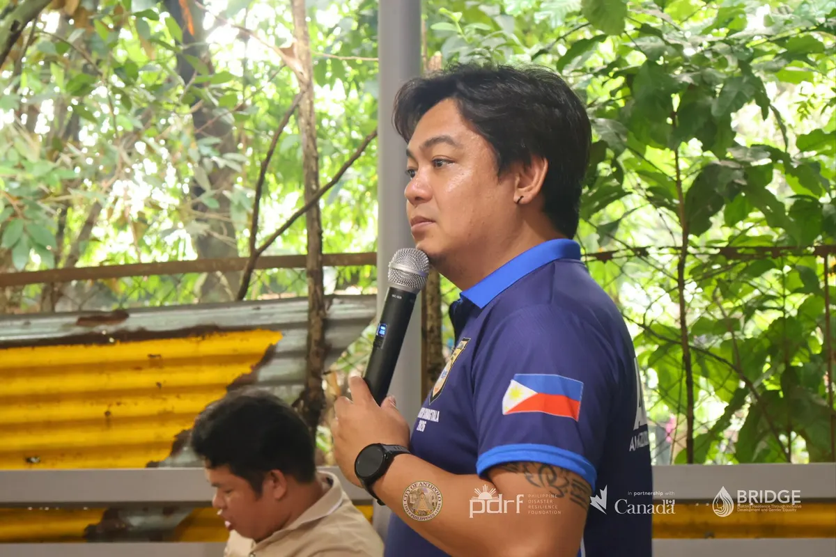A facilitator speaks during the community mapping activity.